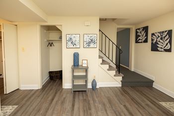 A hallway with a staircase at Chapel Valley Townhomes, Maryland